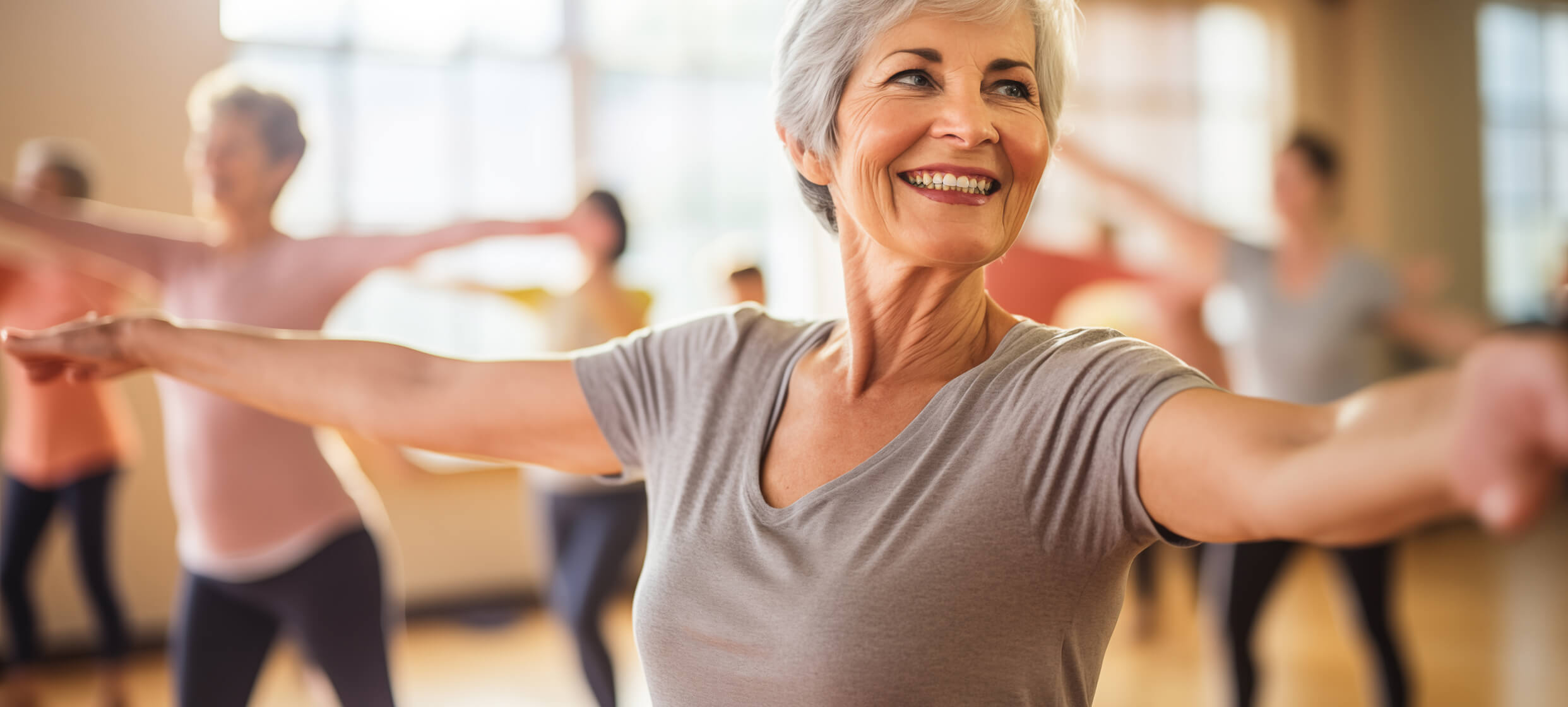 Older woman practicing yoga.