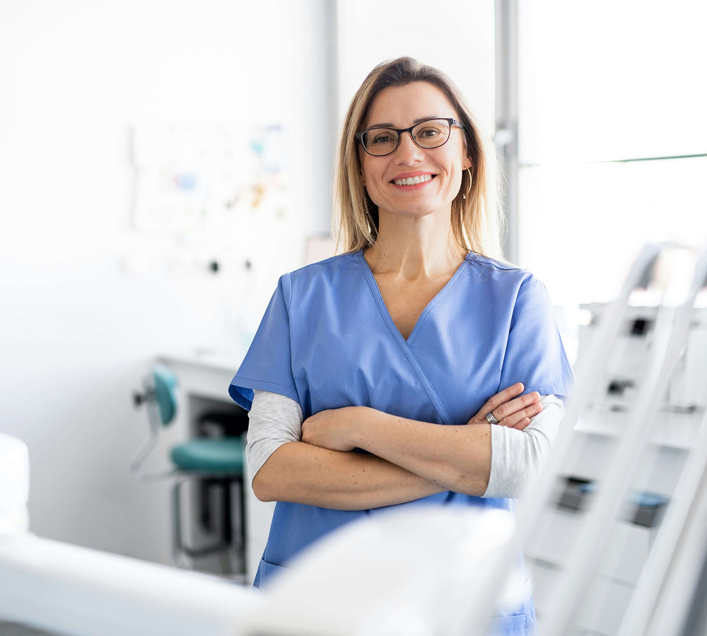 Healthcare professional smiling in clinical setting for professional services